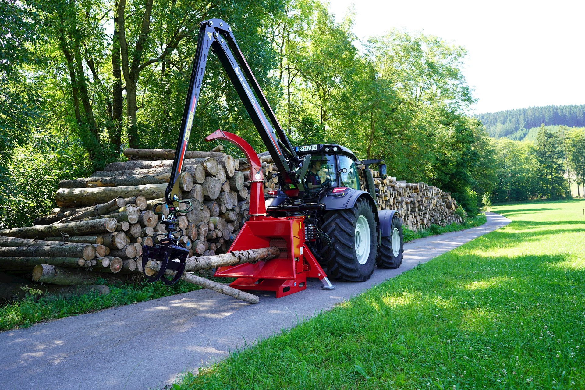 TP Chippers kraanaga puiduhakkurid