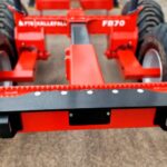 Protective bracket for licence plate lights